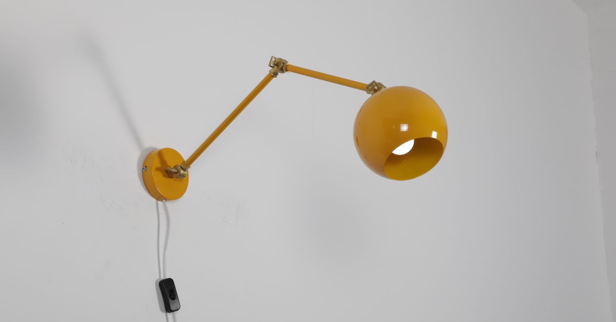 Installation d'une applique sur un mur
