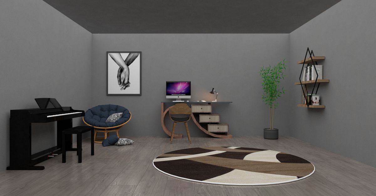 Coin bureau discret aménagé dans un salon avec étagères murales et lampe d'appoint